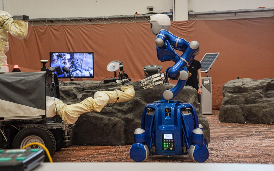 Orbiting astronaut oversees robot team on Earth