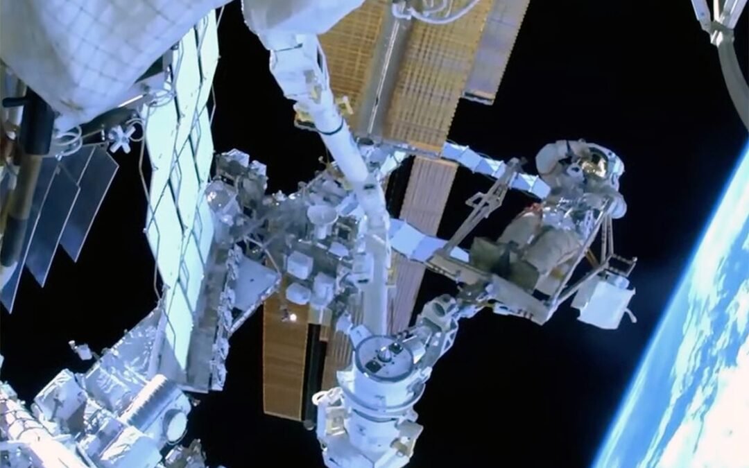 Russian cosmonaut becomes 1st to ride European robotic arm on ISS spacewalk