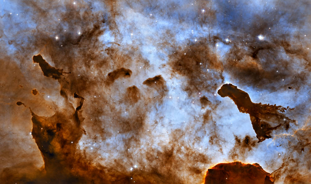 What’s Inside the Carina Pillars? Massive Protostars and Newly-Forming Planets!