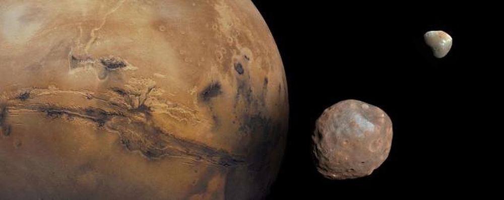 Did An Ancient Icy Impactor Create the Martian Moons?